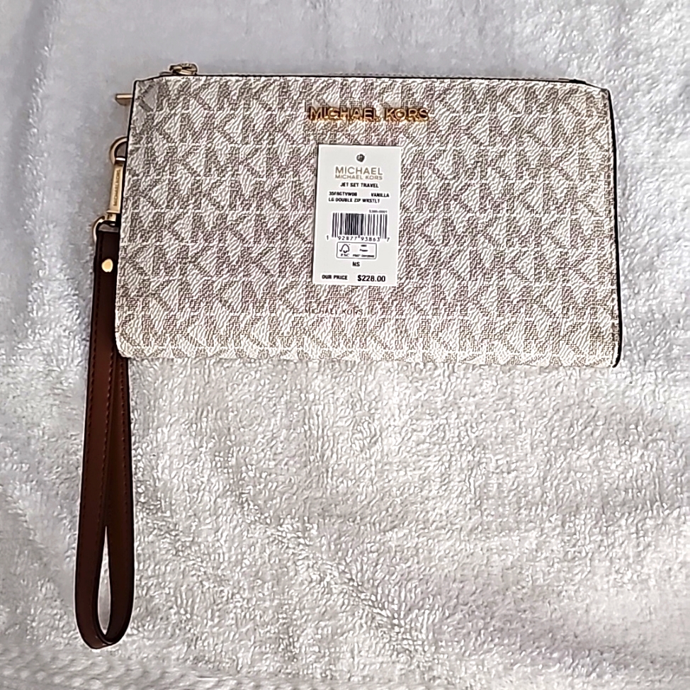 Michael Kores Jet Set Travel